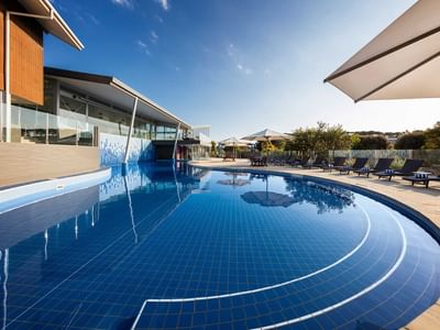 Solar-heated freeform outdoor pool