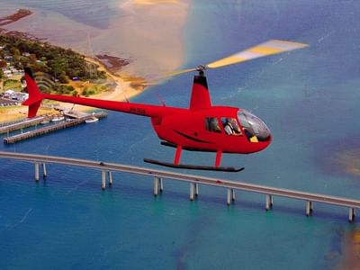 Helicopter in air at Island Helicopters at Silverwater Resort